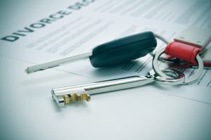 keys on top of a divorce document 