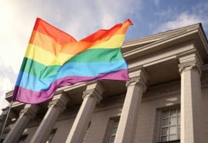 lgbt flag flying with the wind blowing