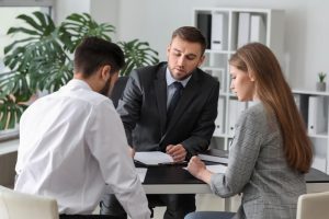 postmarital agreement lawyer in austin in a consultation meeting with clients