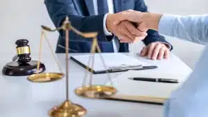 a family law attorney in austin and a woman shaking hands