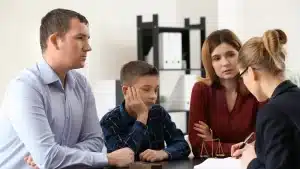 Parents talking to a Lawyer in Austin about Child custody and visitation